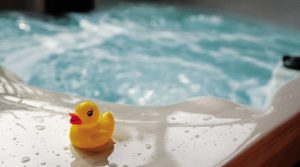 hot tub with yellow duck next to it