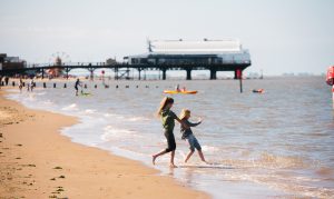 Children playing in the sea at Cleethorpes