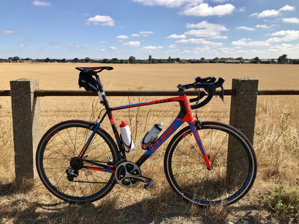 Image of fields at Irby with bike