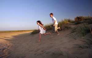 Children running on Fitties Beach